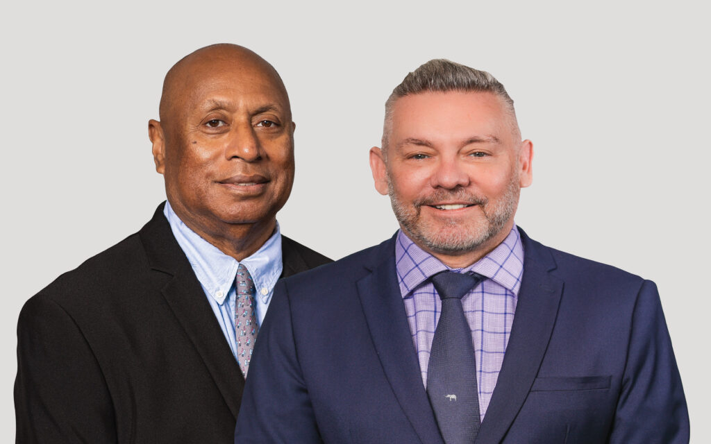 Kina Bank ChairmanIsikeli Taureka (left) and CEO Greg Pawson (Right)